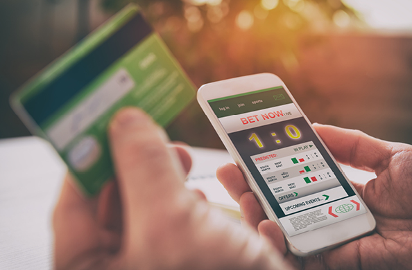 mobile phone with screen open to a betting app
