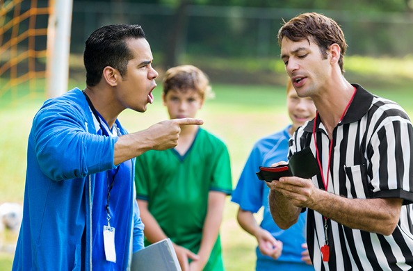 coach yelling at the umpire
