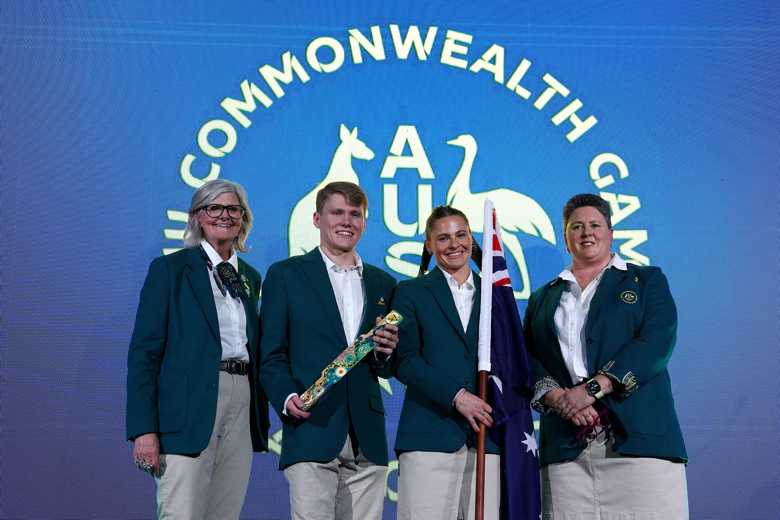 GLASGOW, SCOTLAND - JULY 22: Her Excellency, The Honourable Sam Mostyn AC, Governor-General of Australia, Tim Hodge OAM, Baton Bearer of Team Australia, Nina Kennedy OAM, Flag Bearer of Team Australia, and Petria Thomas, OAM OLY, Chef de Mission, pose for a photo during an Australia Reception ahead of the Glasgow 2026 Commonwealth Games at Bridge Gardens on July 22, 2026 in Glasgow, Scotland