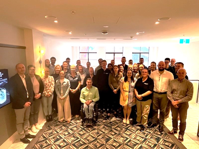 National Integrity Managers stand together for a group photo on day two of the National Integrity Manager forum in Melbourne, Australia