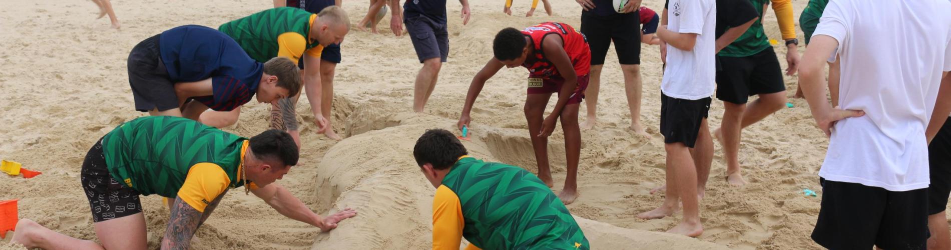 building sand sculptures being built at the QLD PCYC Youth Development Program