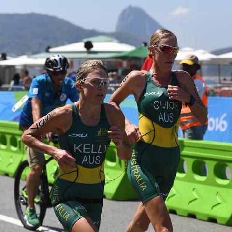 Katie Kelly and sighted guide Michelle Jones compete in the PT5 Triathlon at the 2016 Paralympic Games