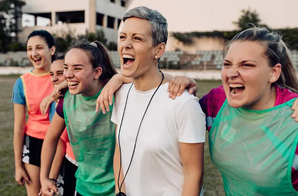 coach and her players yelling