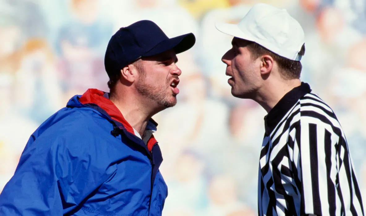 coach yelling at official