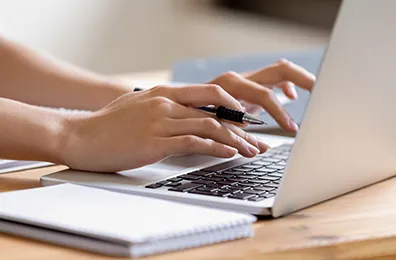 typing on a laptop