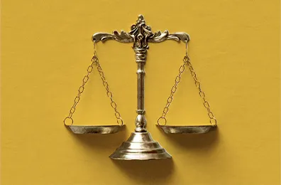 scales on a yellow background