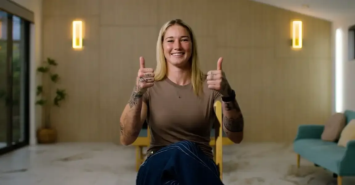 Tayla Harris - AFLW athlete and professional boxer, gives two thumbs up for new eLearning by Sport Integrity Australia