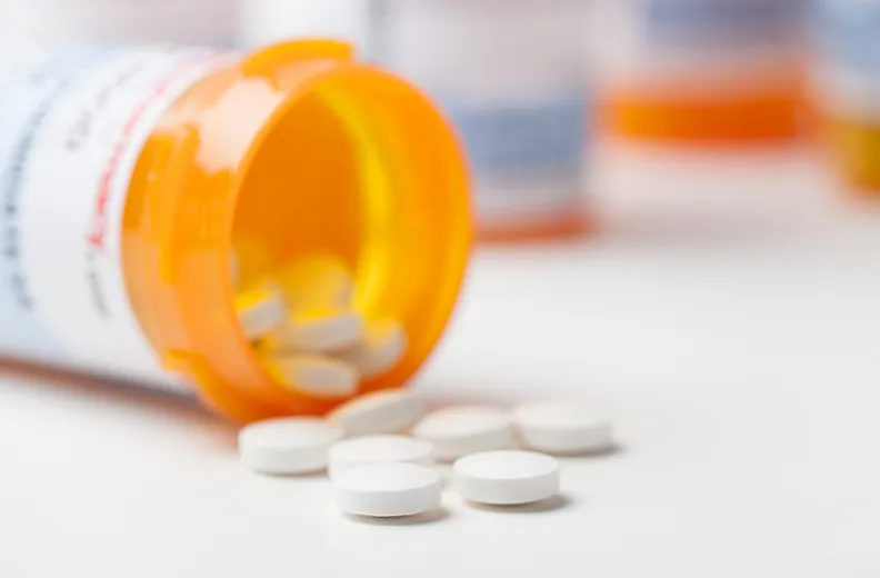 glucocorticoid pills spills from a container