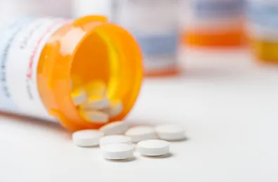 glucocorticoid pills spills from a container